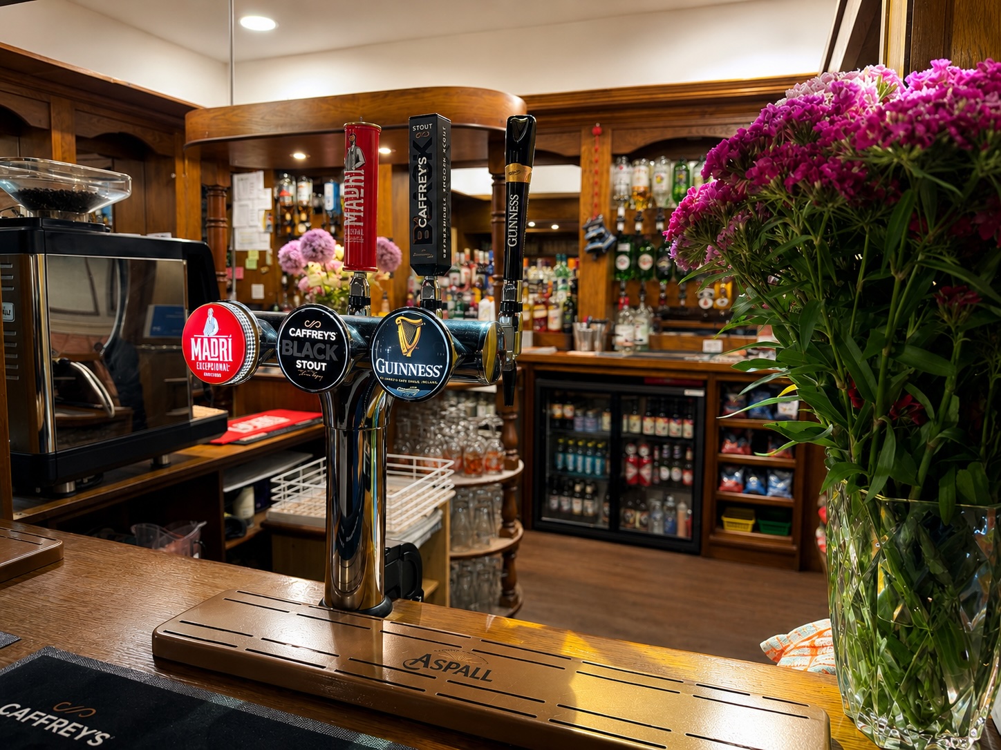 Draught bar at The Crown and Anchor — Madri, Caffrey's Black Stout and Guinness on tap